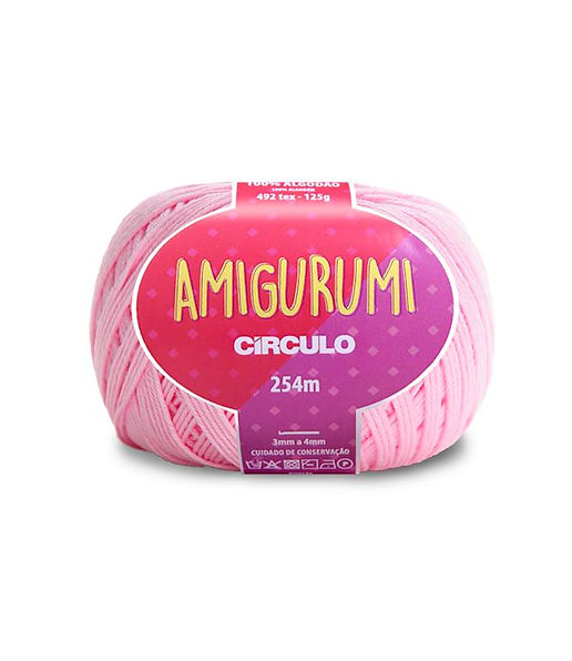 A skein of Circulo brand light pink amigurumi cotton yarn with label showing the brand name and yardage.
