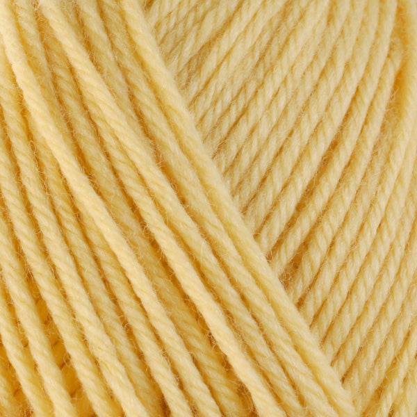 A close-up image of a skein of Berroco Ultra Wool worsted weight yarn in a solid yellow color.