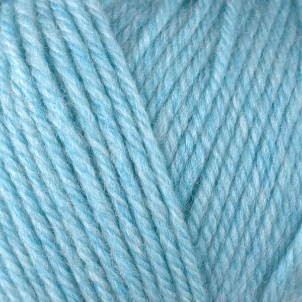 A close-up image of a skein of Berroco Ultra Wool worsted weight yarn in a heathered light blue color.