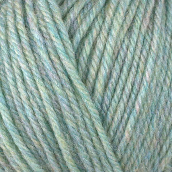 A close-up image of a skein of Berroco Ultra Wool worsted weight yarn in a heathered aqua green color.