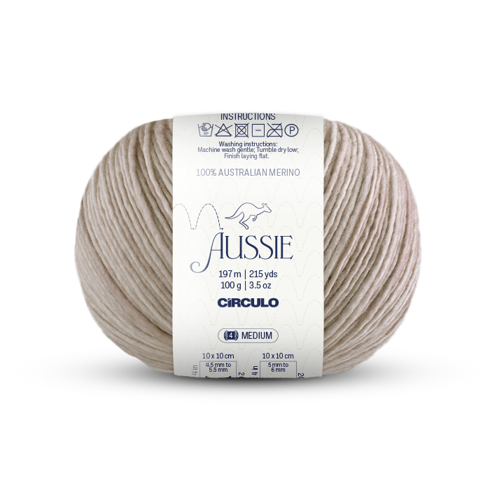 Ball of light beighe yarn with a 'Aussie' label on a white background