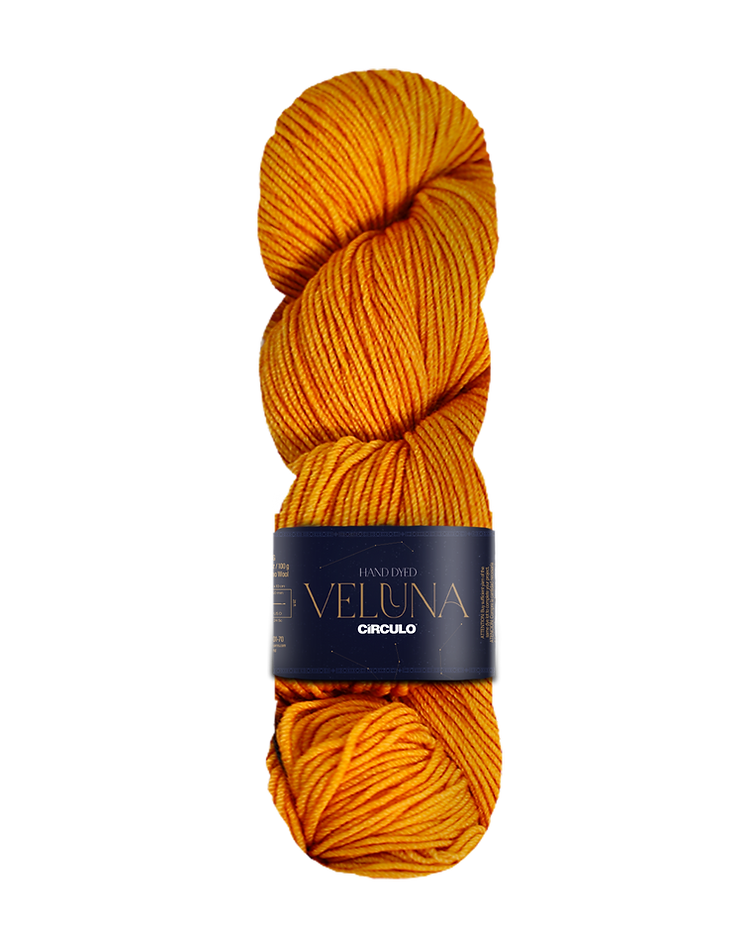 Orange skein of yarn with a label on a white background