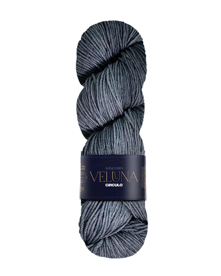 Gray skein of yarn with a label on a white background