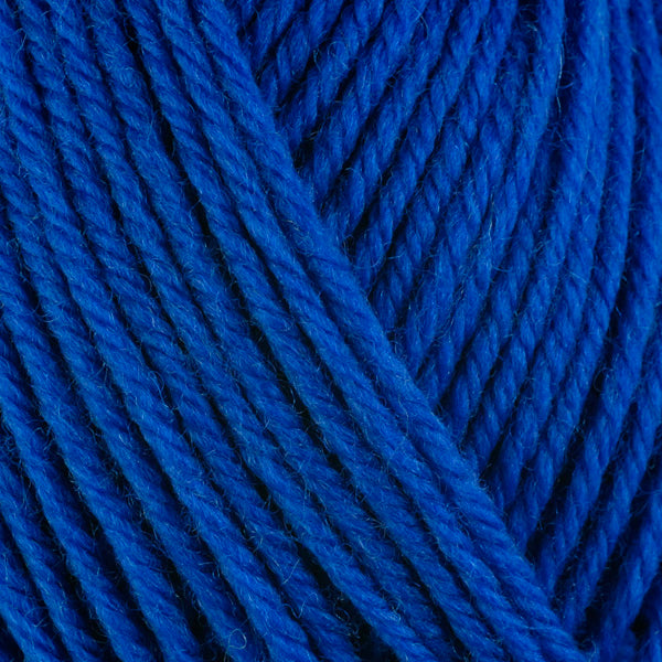 A close-up image of a skein of Berroco Ultra Wool worsted weight yarn in a solid electric blue color.