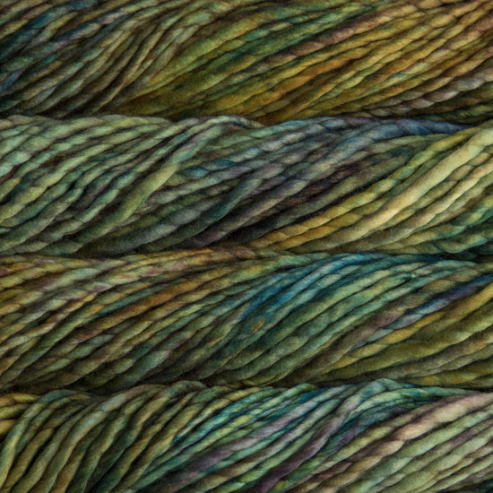 A close-up image of skeins of Malabrigo Rasta yarn in varying shades of green, displaying the texture and color variation.