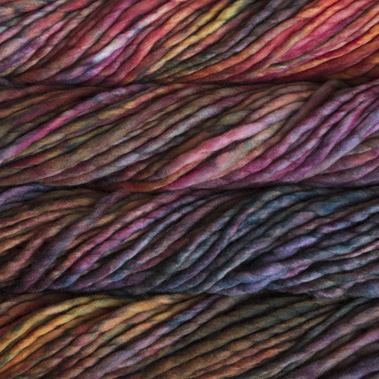 A close-up image of skeins of Malabrigo Rasta yarn in purple, pink, orange, and green shades, displaying the texture and color variation.