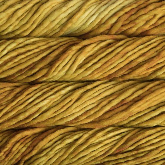 A close-up image of skeins of Malabrigo Rasta yarn in shades of yellow, displaying the texture and color variation.