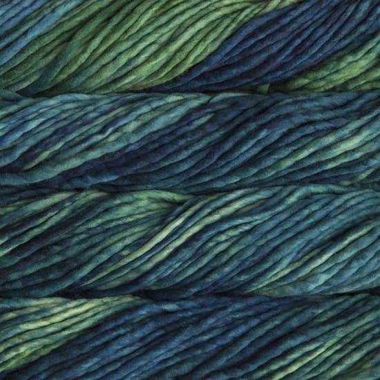 A close-up image of skeins of Malabrigo Rasta yarn in green, teal, and blue shades, displaying the texture and color variation.