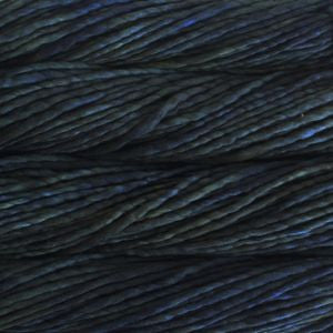 A close-up image of skeins of Malabrigo Rasta yarn in dark green and indigo shades, displaying the texture and color variation.