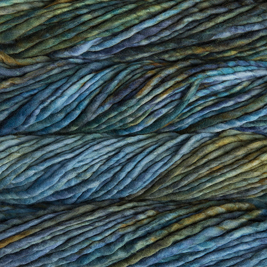 A close-up image of skeins of Malabrigo Rasta yarn in shades of blue and green, displaying the texture and color variation.